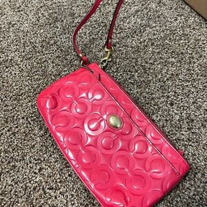 Coach Pink Embossed Leather Wristlet